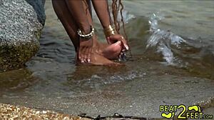 Young and kinky teen gets her feet wet on the beach